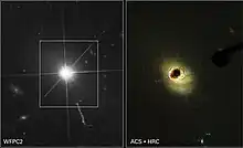 Die umgebende Galaxie wird in einer Aufnahme mit einem Koronograf des Hubble-Weltraumteleskops erkennbar.