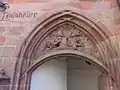 Eh. Portal zum Ratskeller mit zechendem Bürger, Bildhauer Heinrich Wagner aus St. Johann (1907)