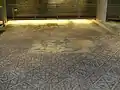 Mosaikfußboden mit dem „Reigen der tanzenden Jahreszeiten-Genien“