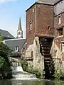 Große  Mühle von  Arenberg, Rebecq. (Beachten Sie die Tauben auf den Schaufeln).