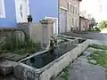 Einer der Dorfbrunnen