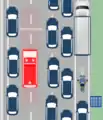 Rettungsgasse bei erlaubtem Befahren des Seitenstreifens durch Zeichen 223.1