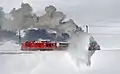 Schneeräu­mung mit­tels Dampf­schnee­schleu­der Xrotd 9213 und Zwei­kraft­lok Gem 4/4