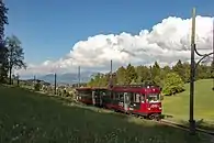 Triebwagen 21 der Rittner Bahn nächst der Haltestelle Rappersbichl (Rappersbühl) am 22. Mai 2016