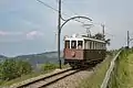 Triebwagen 2 der Rittner Bahn nächst der Haltestelle Wolfsgruben am 27. Mai 2016