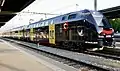 SCB-Werbezug der BLS im Bahnhof Thun