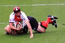 Matt Giteau wird getackelt