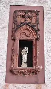 Sakramentsnische der alten Martinskirche in Grünstadt; heute als Spolie in Boßweiler