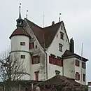 «Schloss» mit rundem Treppenturm