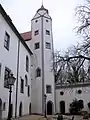 Renaissance-Treppenturm am Ostflügel, mit Kielbogengiebeln und sechseckigem Zeltdach