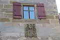 Paumgartner-Wappen in Grünsberg (1723, mit ehelichen Beiwappen Rieter und Nützel)