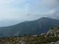 Blick von der Serra di Pigno über das Tal des Fium'Albino zur Cima di Gratera