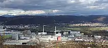 St.Chrischona-Panorama gesehen von der vorderen Burgruine Wartenberg in Muttenz, Schweizerhalle und Rhein im Vordergrund