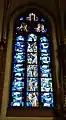 Linkes Chorraumfenster mit Motiven aus dem AT