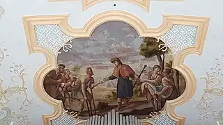 Der hl. Rochus verteilt Almosen