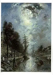  Auf einer Gracht in Rotterdam ankert vom Mond beschienen ein Segelboot.