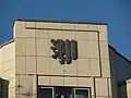Wappen an einem Wohnhaus an der Hauptstraße