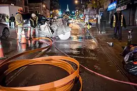 Rad-Grabenfräse zum Ausheben von schmalen Gräben (micro trenching) zur Verlegung von Glasfaserkabel