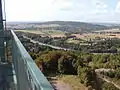 Blick über die BAB 2 nach Bad Eilsen am Harrl mit dem Kraftwerk Heyden rechts am Horizont