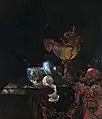Stillleben von Willem Kalf; Nautiluspokal in Gold gefasst mit mythologischen Figuren