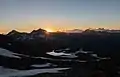 Sonnenaufgang über dem Wildenkogel. Im Hintergrund der Großglockner.