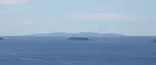 Gogland (im Hintergrund) von Kotka in Finnland aus gesehen.