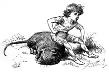 Auf der Erde liegt eine tote Maus, darauf sitzt Bruno, der sich nach vorne beugt und sich mit der linken Hand auf seinem Knie abstützt.