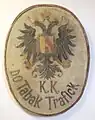 Tabakmuseum in Frastanz, Rathaus – Wandschild: "k. k. Tabak-Trafick" mit Doppeladler.