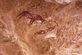 Vieh mit Frau in einer Hütte