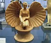 Terrakotta-Statuette der Aphrodite in einer Muschel,drittes Jahrhundert v. Chr.(Staatliche Antikensammlungen, München)