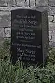 Grabstein von 1907 des ältesten noch sichtbaren Grabes auf dem Friedhof, Grab des Pfarrers Heinrich Sorge und zwei seiner Verwandten