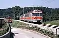 Ein orange-silberner GFM-Zug, um 1980