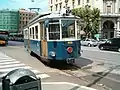 Türseite von Triebwagen 406 an der Piazza Oberdan