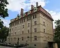 Tulbeckstraße 33, barockisierend (1920–22), Teilanlage zu Gollierstraße 54/56/56a und b