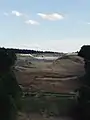 Blick vom Tunnel Bleßberg zur Baustelle der Talbrücke und zum Geländeeinschnitt für den Bahnhof Theuern, Juni 2007