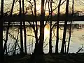 Sonnenuntergang im zeitigen Frühjahr