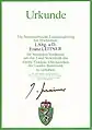 Verleihungsurkunde des Großen Goldenen Ehrenzeichens des Landes Steiermark für Franz Leitner, 27. November 1995