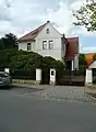 Villa mit Einfriedung