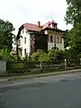 Mietvilla mit Einfriedung