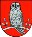BettenhausenIn Rot ein auf einem durchgehenden belaubten silbernen (weißen) Zweig sitzender silberner (weißer) Waldkauz