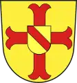 schwebendes rotes Mühleisenkreuz, belegt mit einem goldenen Herzschild