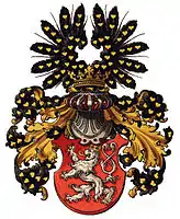 Königreich Böhmen: Oberwappen:Auf goldbekröntem, silbernem Spangenhelm mit schwarz-goldener Helmdecke ein offener schwarzer Flug, jeweils belegt mit goldenen Lindenblättern.Ströhl, 1890