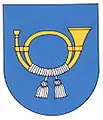 rechts liegendes goldenes Posthorn mit silbernem Band und zwei Quasten