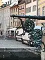 Wasseraustritt mit Schmiedeverzierung