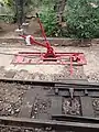 Handstell­ein­rich­tung ei­ner Wei­che im Bahn­hof Pal­ma, Gleis nach Sóller