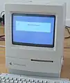 Startbildschirm mit Logo im  „Picasso-Stil“ auf einem Macintosh Classic II