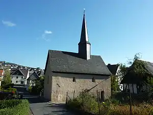 Wommelshausen, (Alte Kirche Wommelshausen), verm. Bauzeit 10./11. Jh., Reparaturmaßnahmen 1269/1274 belegt