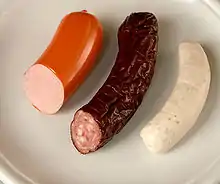 Brühwurst:  1) Geräucherte Fleischwurst (Lyoner) im Kunstdarm,  2) heißgeräucherte und getrocknete Dauerwurst aus Österreich im Kunstdarm,  3) Weißwurst im Naturdarm