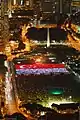Mitglieder der National Trades Union Congress  formen die Nationalflagge